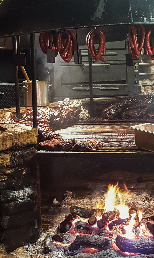 The pit is where all the magic happens at the Salt Lick in Driftwood, Texas. www.casualtravelist.com